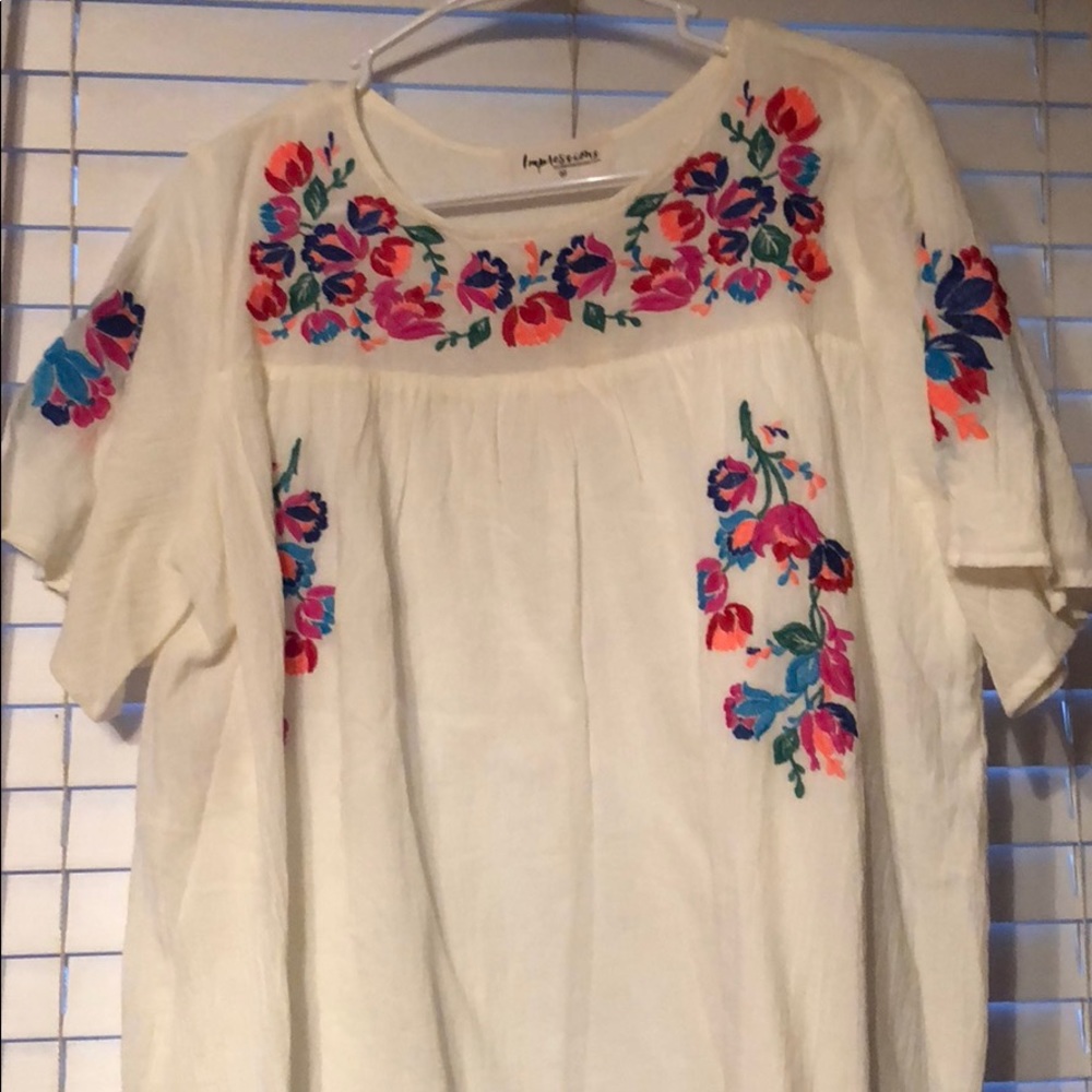 White dress with floral detail